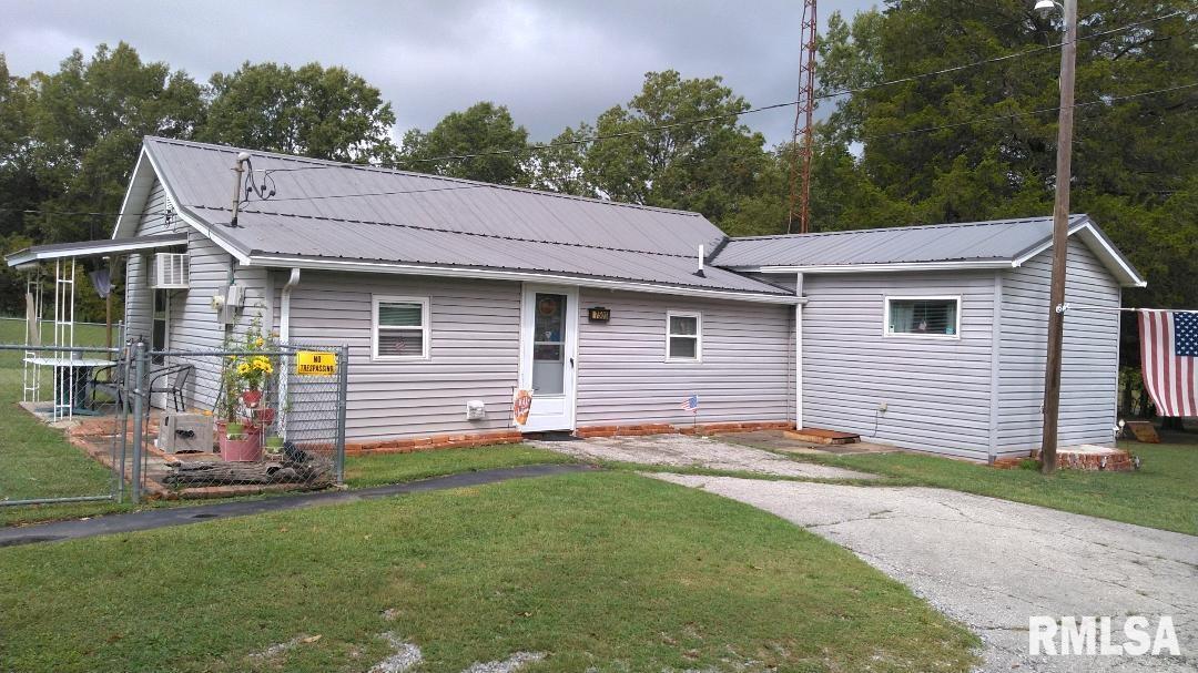 a view of a backyard with a garden