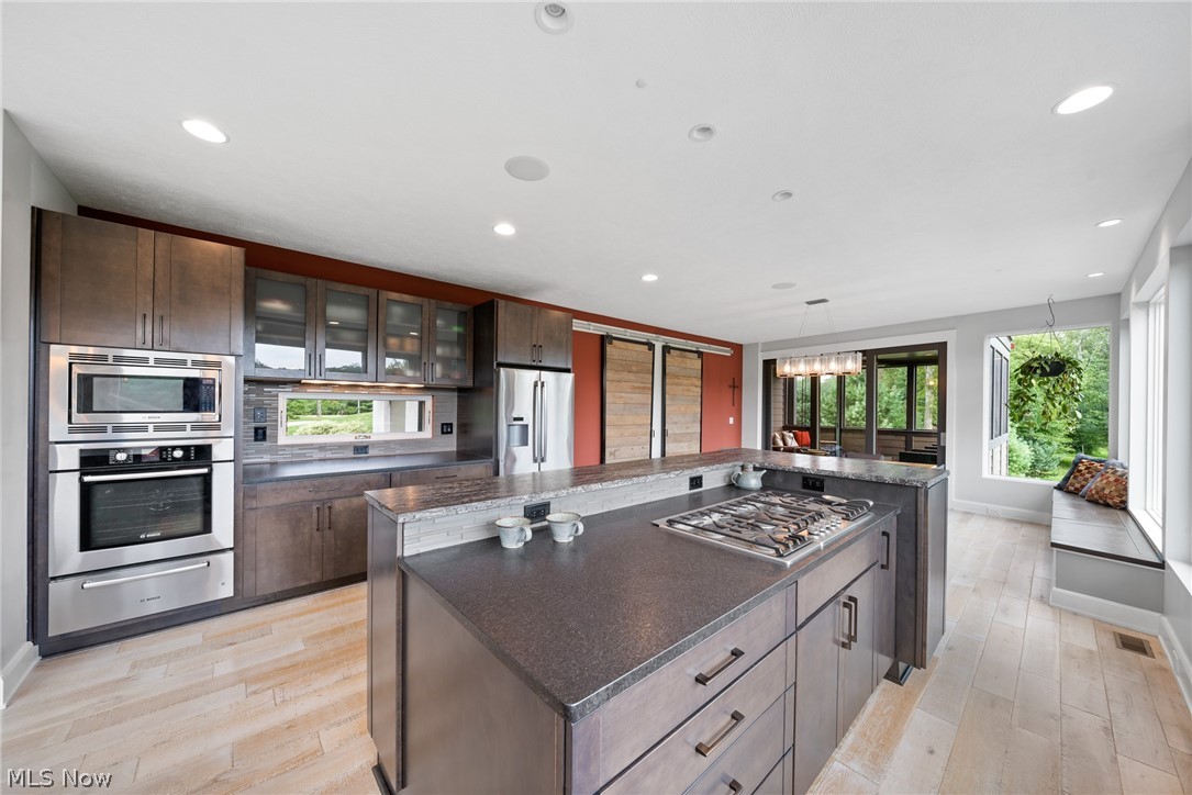 18905 Munn Road Chagrin Falls, OH 44023 - Photo 10 of 35 Gas cooktop 36" with downdraft ventilation in island