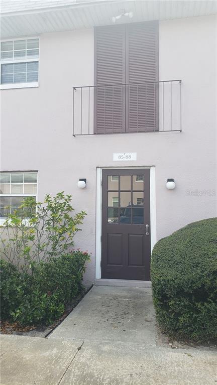 525 South Conway Road, Unit 86 Orlando, FL 32807 - Photo 1 of 1 a view of entryway with kitchen