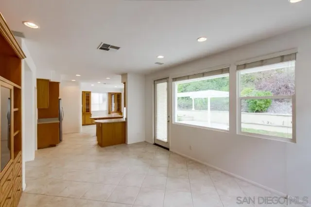 a large living room with a large window