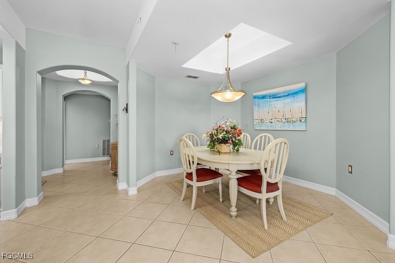 11079 Harbour Yacht Court, Unit 102 Fort Myers, FL 33908 - Photo 7 of 28 a view of a dining room with furniture