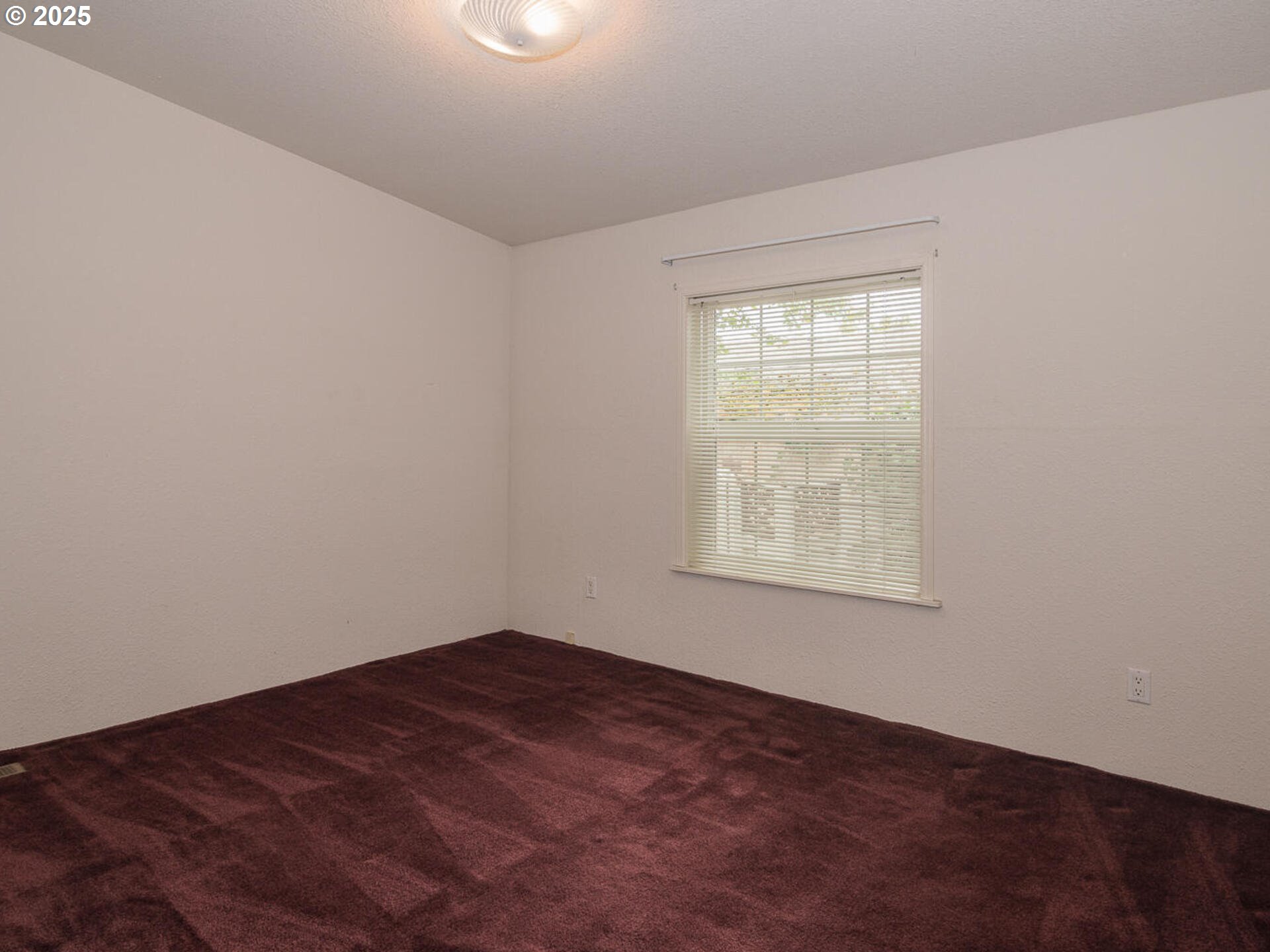 1949 Southeast Palmquist Road, Unit 91 Gresham, OR 97080 - Photo 19 of 40 an empty room with a window