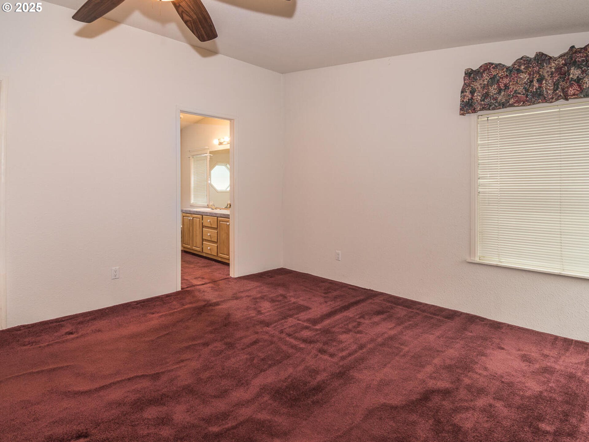 1949 Southeast Palmquist Road, Unit 91 Gresham, OR 97080 - Photo 27 of 40 an empty room with a window