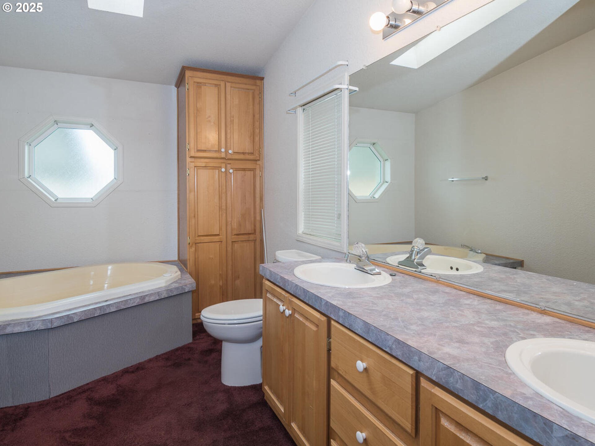 1949 Southeast Palmquist Road, Unit 91 Gresham, OR 97080 - Photo 30 of 40 a bathroom with a granite countertop sink toilet and mirror