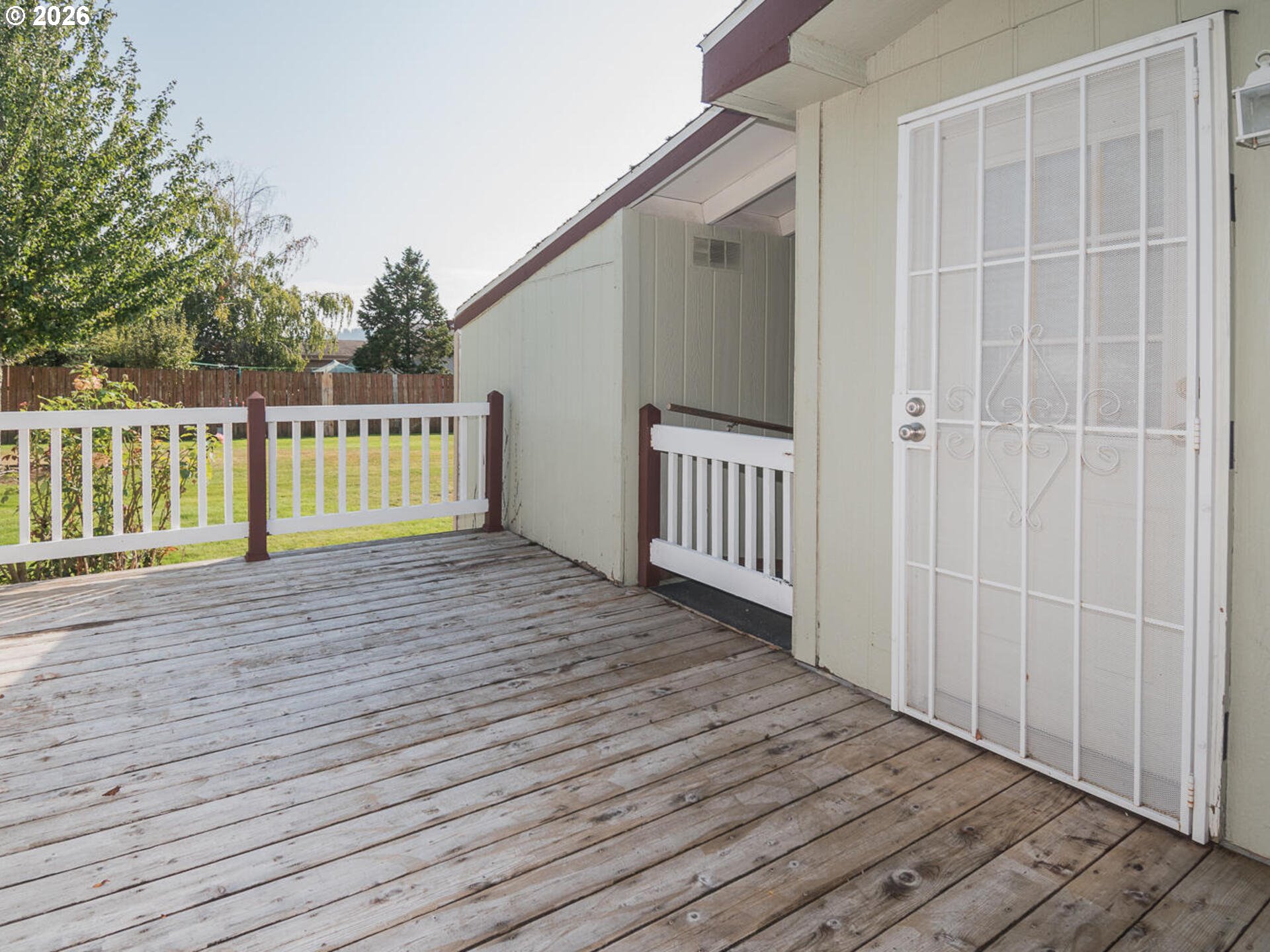 1949 Southeast Palmquist Road, Unit 91 Gresham, OR 97080 - Photo 43 of 43 a view of porch with wooden floor