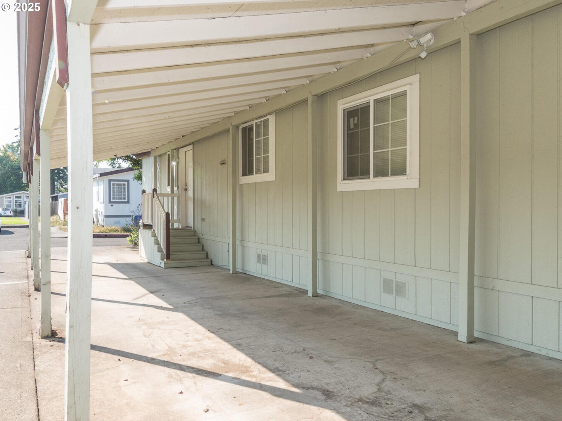 1949 Southeast Palmquist Road, Unit 91 Gresham, OR 97080 - Photo 6 of 40 a view of a brick house with a outdoor space