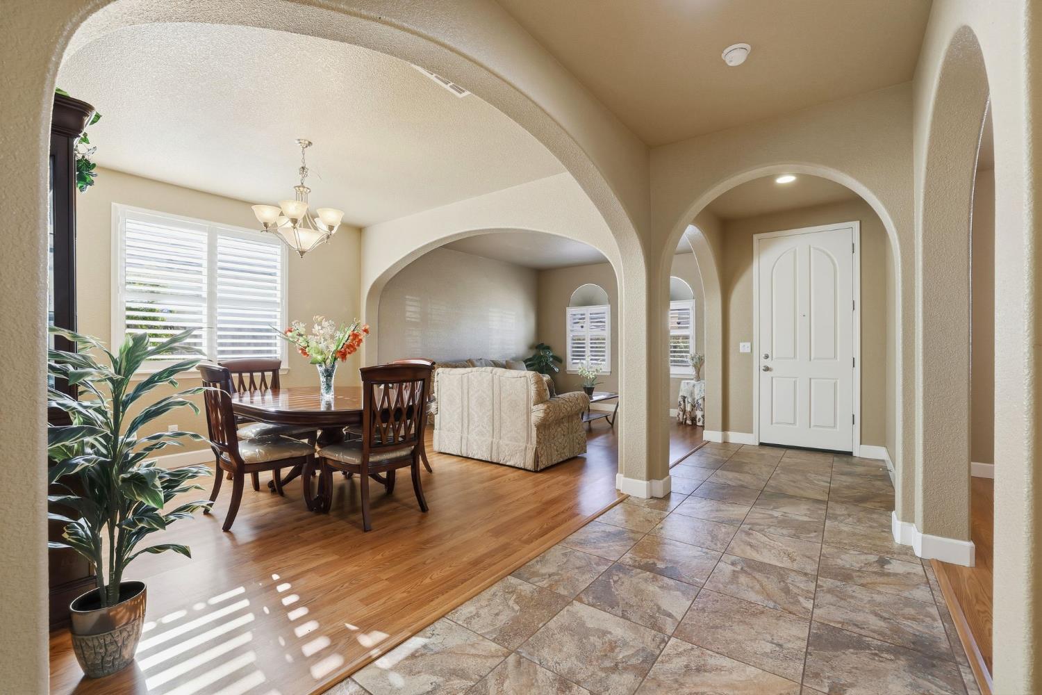 1730 Tasca Lane Manteca, CA 95337 - Photo 11 of 83 a view of a livingroom with furniture and chandelier