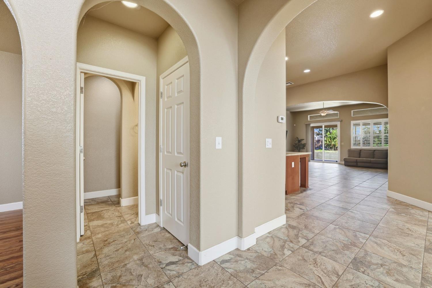 1730 Tasca Lane Manteca, CA 95337 - Photo 15 of 83 Half Bathroom , Storage closet (left archway)