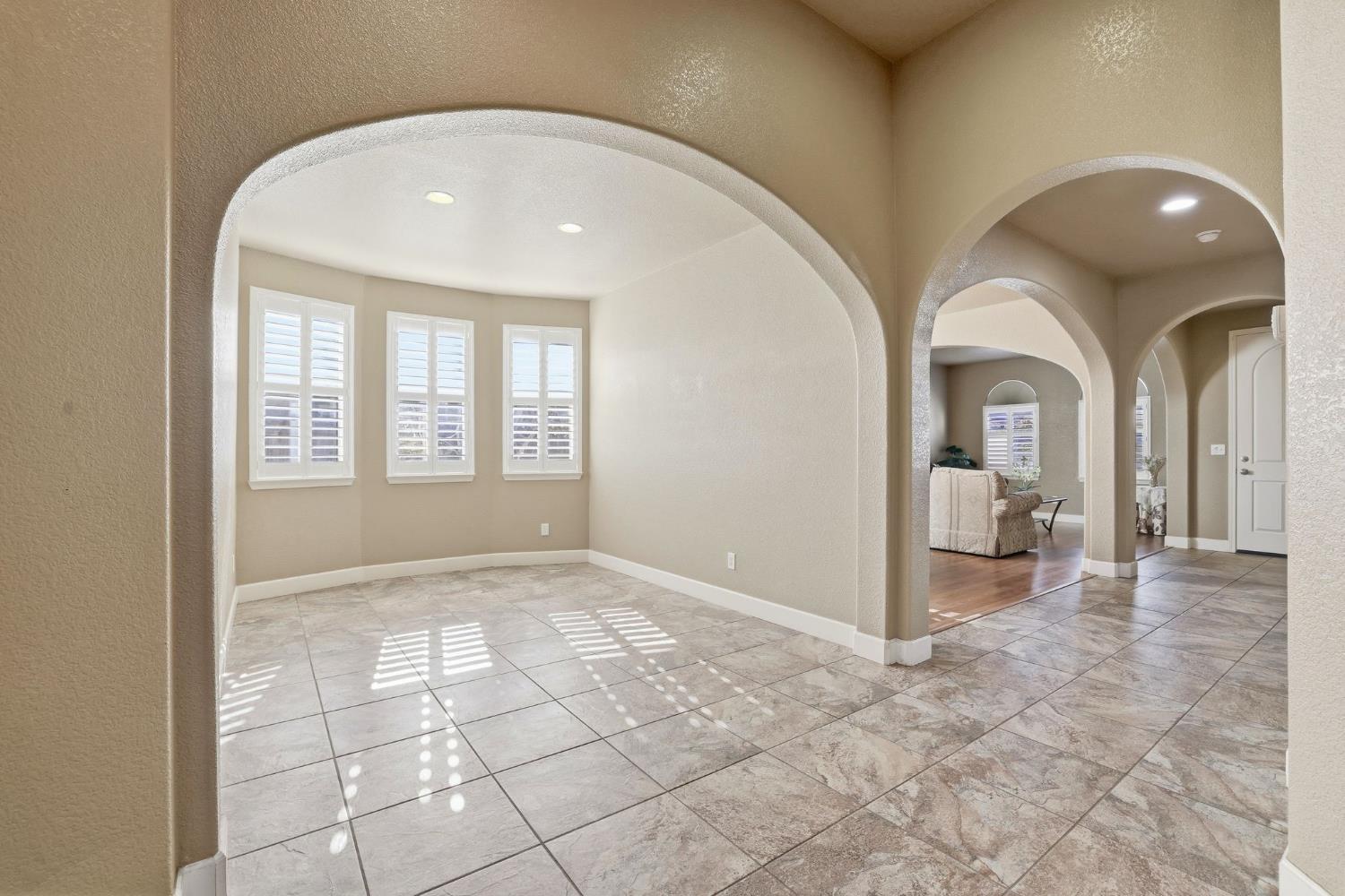 1730 Tasca Lane Manteca, CA 95337 - Photo 18 of 83 breakfast nook / breakfast bar: room featuring arched walkways, recessed lighting