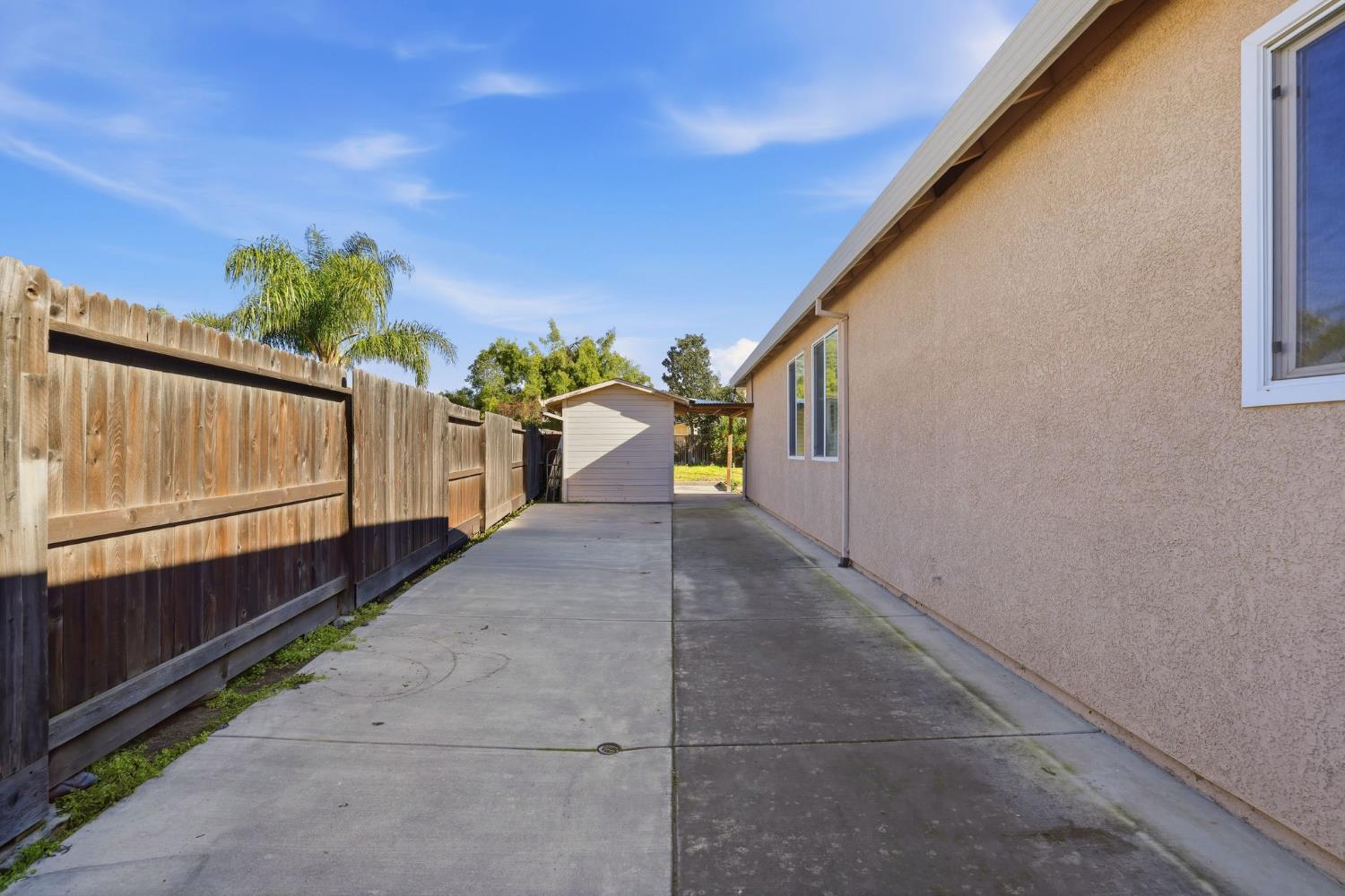 1730 Tasca Lane Manteca, CA 95337 - Photo 75 of 83 view of patio / terrace featuring an outdoor structure (shed)