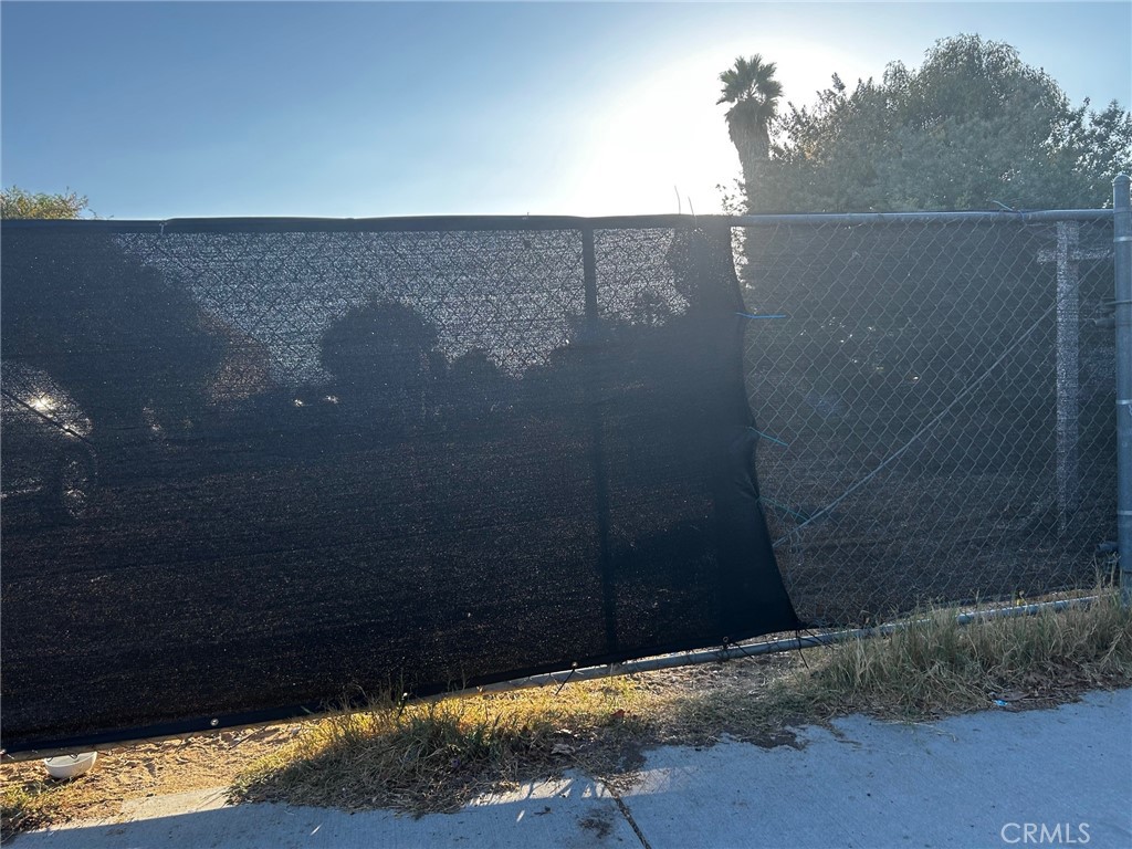 a view of a wooden fence