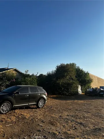 a view of a car parked on the side of the road