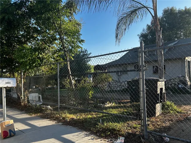 a view of a street sign on a sidewalk