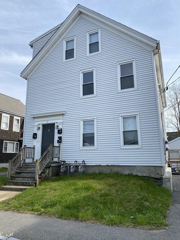 a front view of house with yard