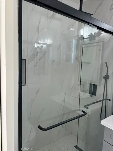 a kitchen with a sink cabinets and window