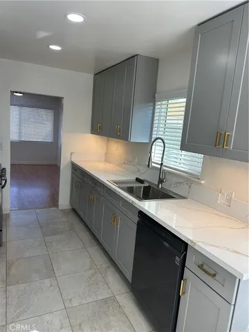 a view of a living room and wooden floor