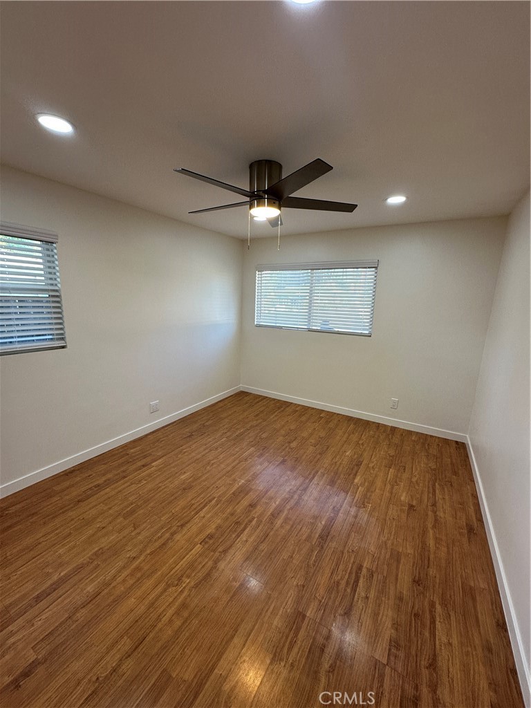 19140 Strathern Street Reseda, CA 91335 - Photo 10 of 33 a view of an empty room with wooden floor