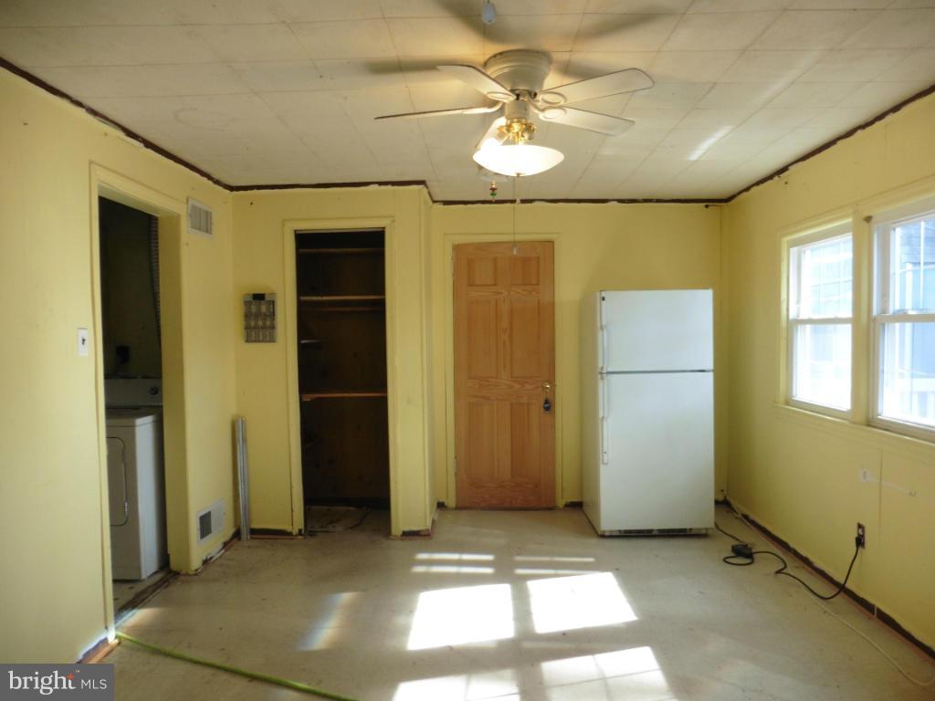 2720 Randolph Road Silver Spring, MD 20902 - Photo 11 of 16 an empty room with windows and closet