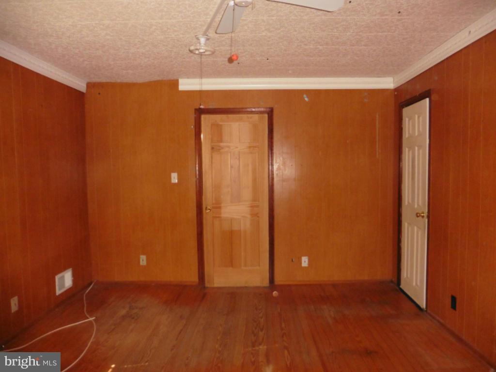 2720 Randolph Road Silver Spring, MD 20902 - Photo 12 of 16 a view of an empty room with wooden floor