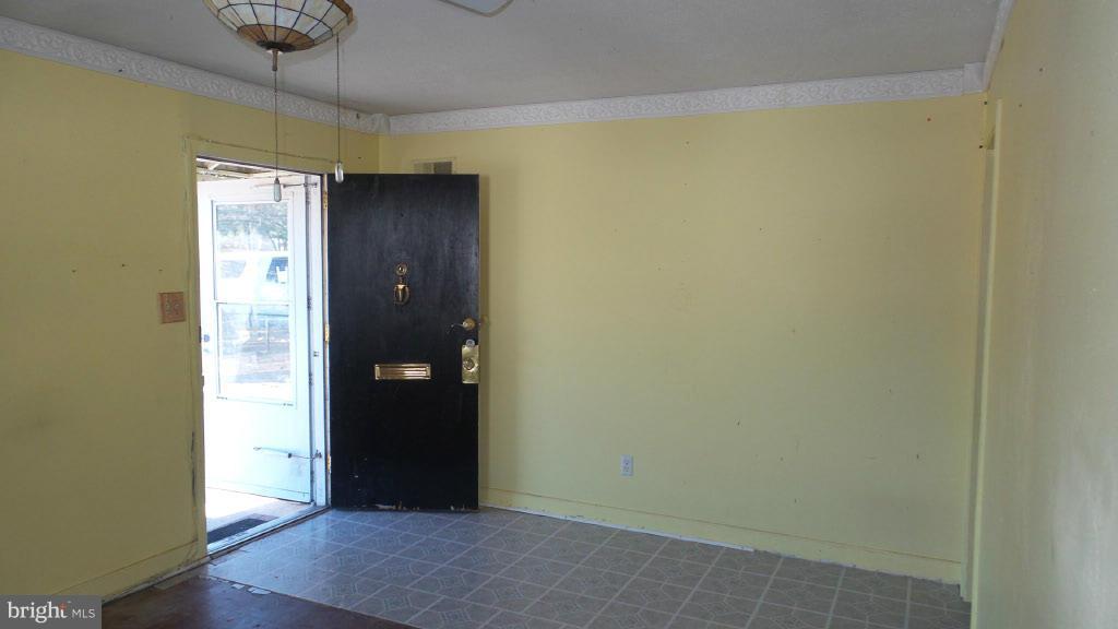 2720 Randolph Road Silver Spring, MD 20902 - Photo 6 of 16 an empty room with wooden floor