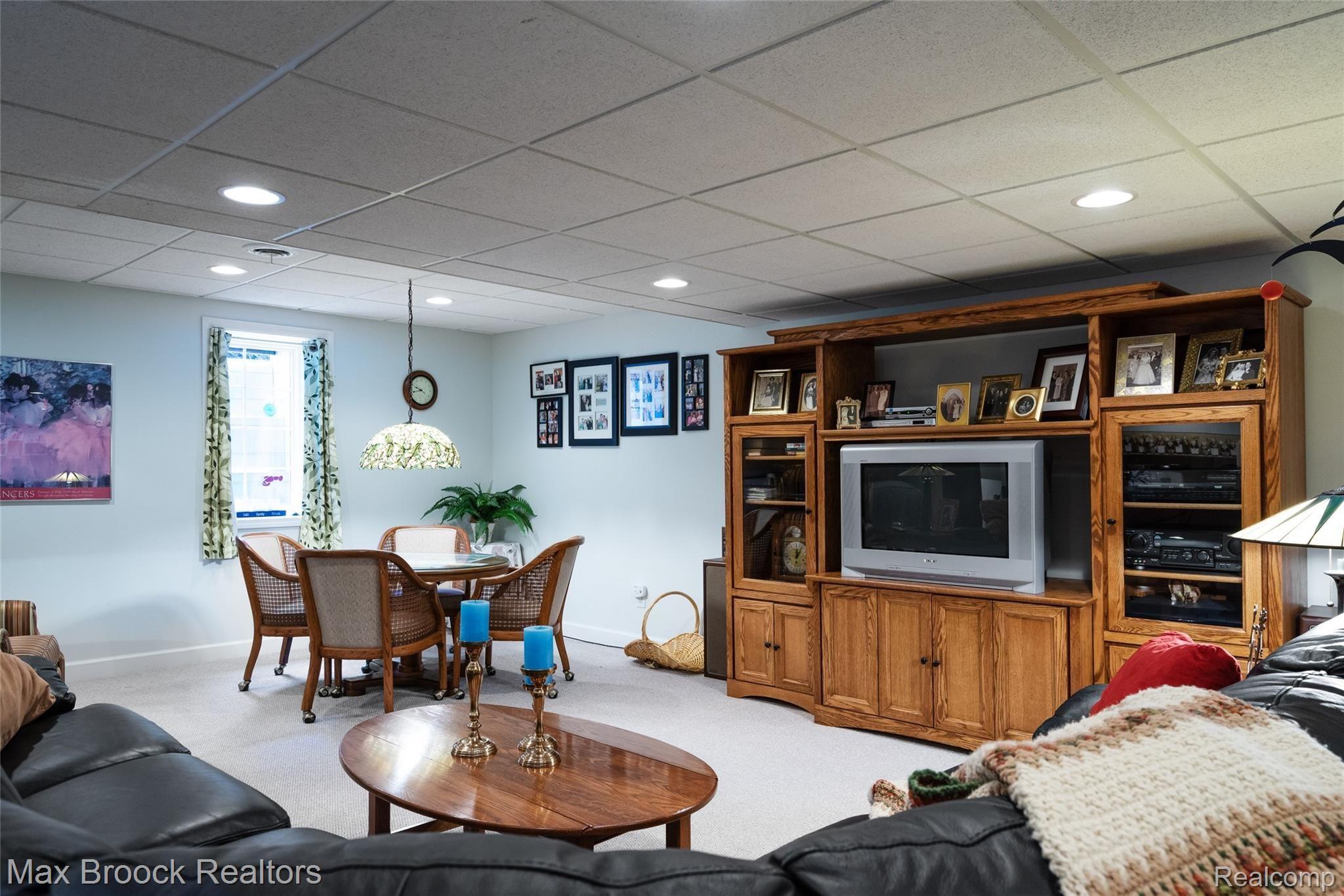 5103 Belmonte Drive, Unit 58 Rochester, MI 48306 - Photo 25 of 34 Lower Level Family Room with Egress Window