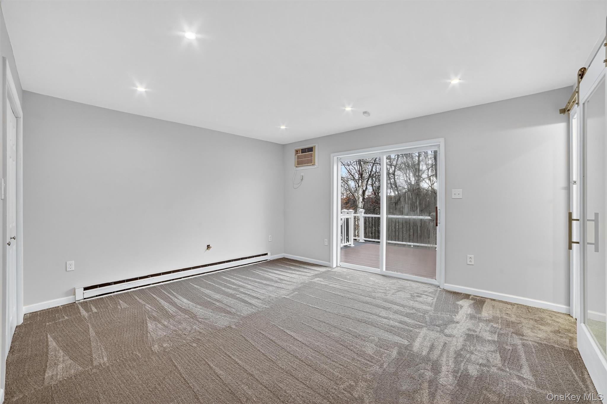 7 Richard Road Mahopac, NY 10541 - Photo 11 of 29 a view of an empty room with wooden floor and a window