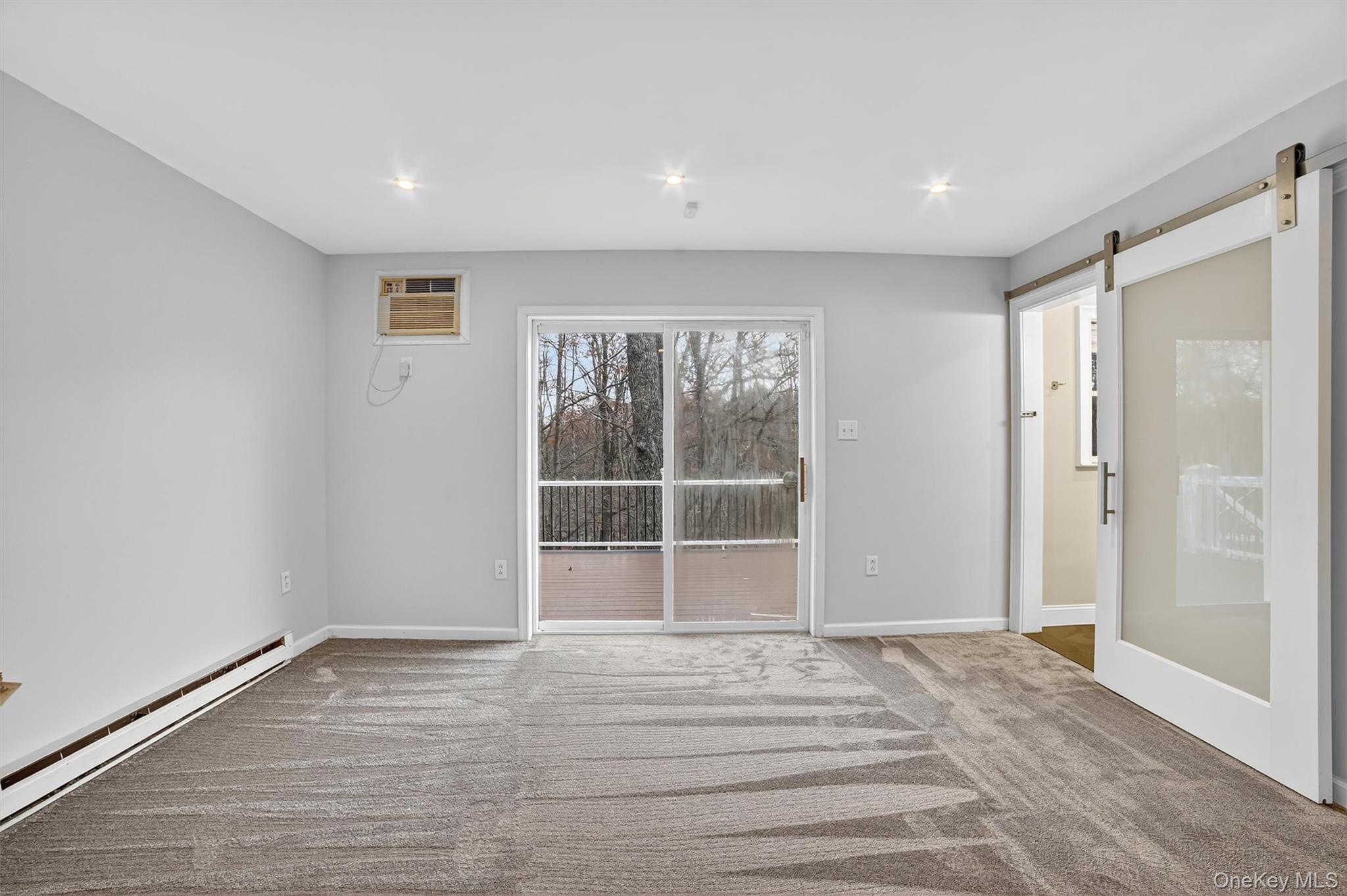 7 Richard Road Mahopac, NY 10541 - Photo 13 of 29 a view of empty room with wooden floor and fan
