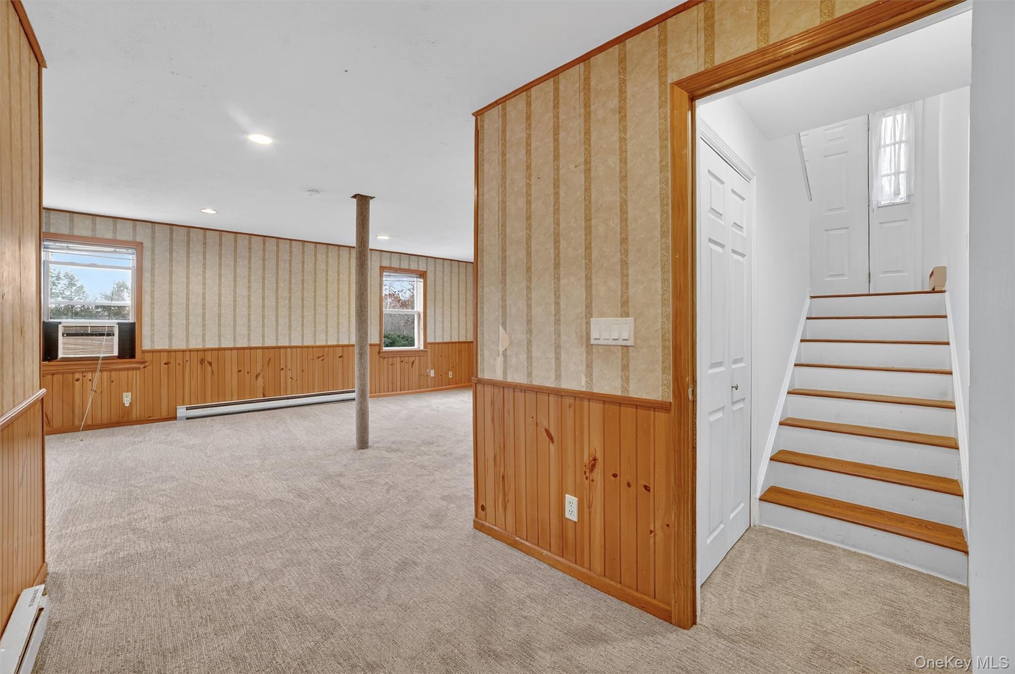 7 Richard Road Mahopac, NY 10541 - Photo 17 of 29 a view of a livingroom with entryway and stairs