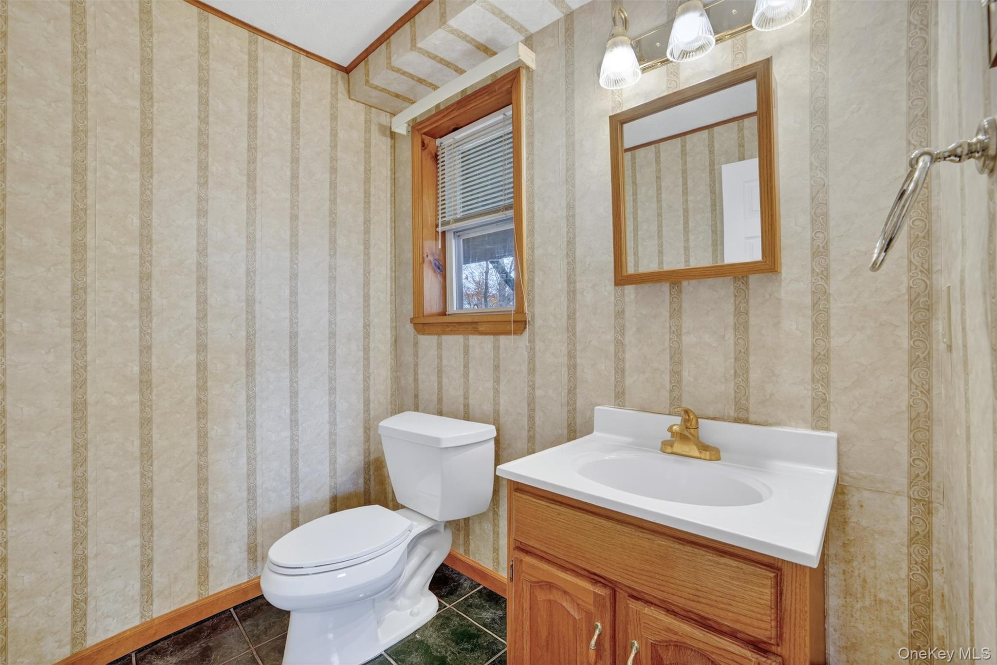 7 Richard Road Mahopac, NY 10541 - Photo 20 of 29 a bathroom with a sink toilet and vanity