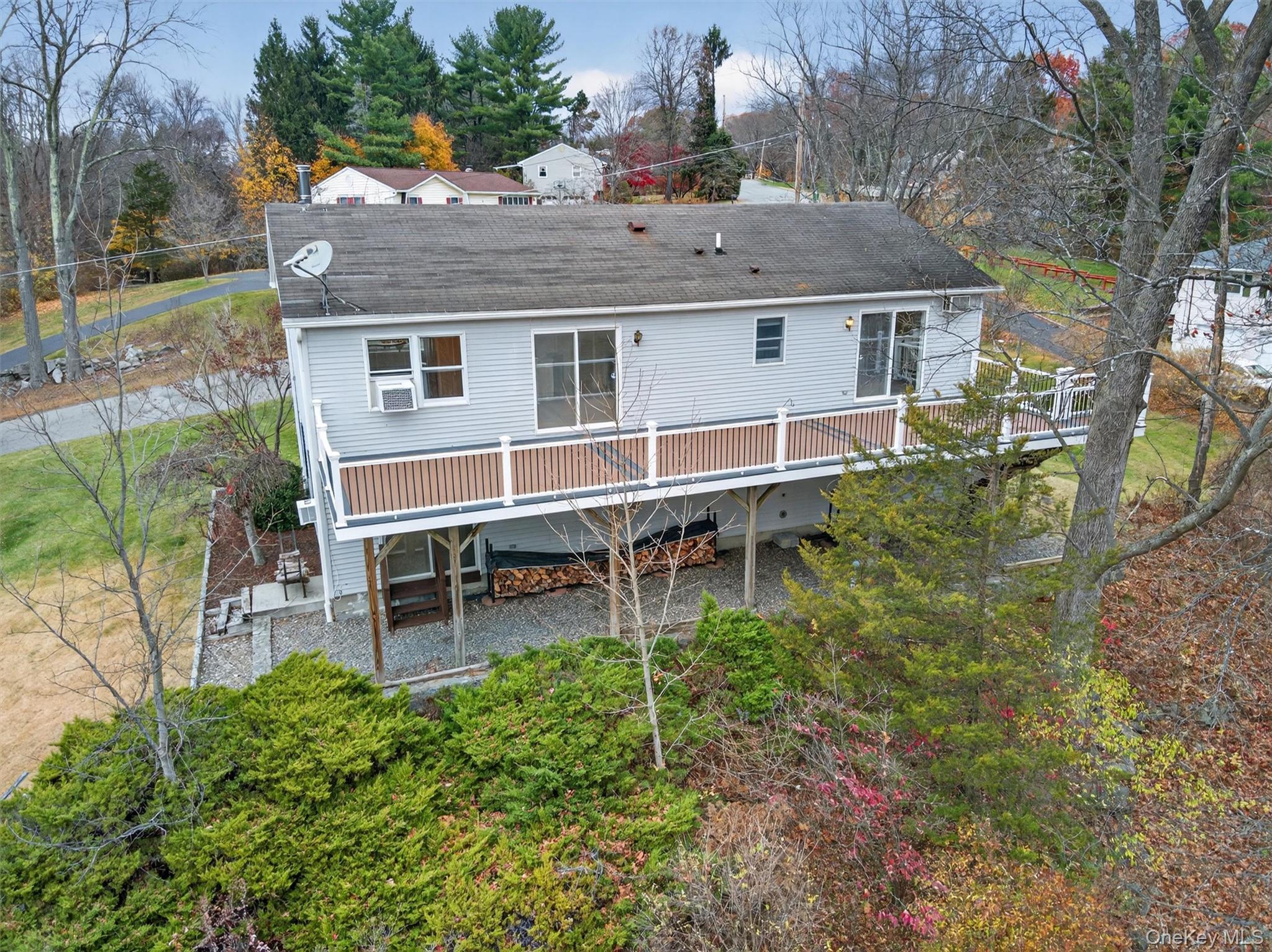 7 Richard Road Mahopac, NY 10541 - Photo 27 of 29 a view of a house with backyard and sitting area