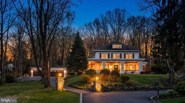 a kitchen with stainless steel appliances granite countertop a sink a stove and refrigerator