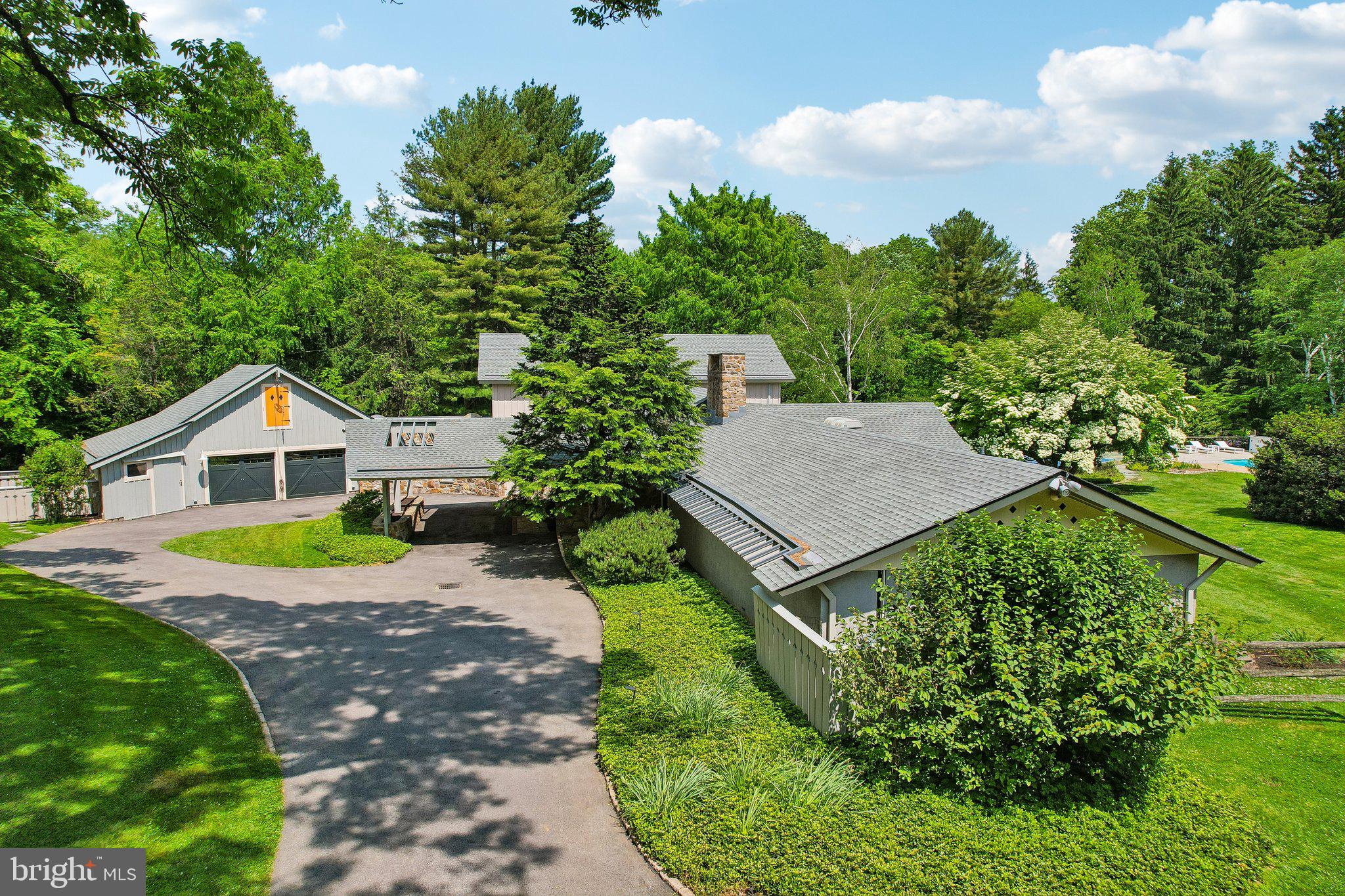 1673 Paper Mill Road Jenkintown, PA 19046 - Photo 4 of 73 a house view with a garden space