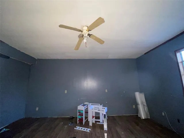 a kitchen with cabinets and appliances