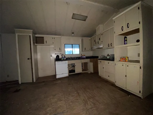 a view of an entryway with wooden wall
