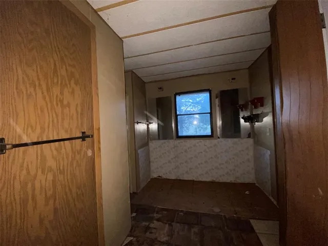 a view of empty room with windows