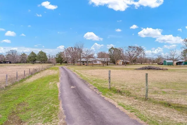 a view of a lake with a big yard