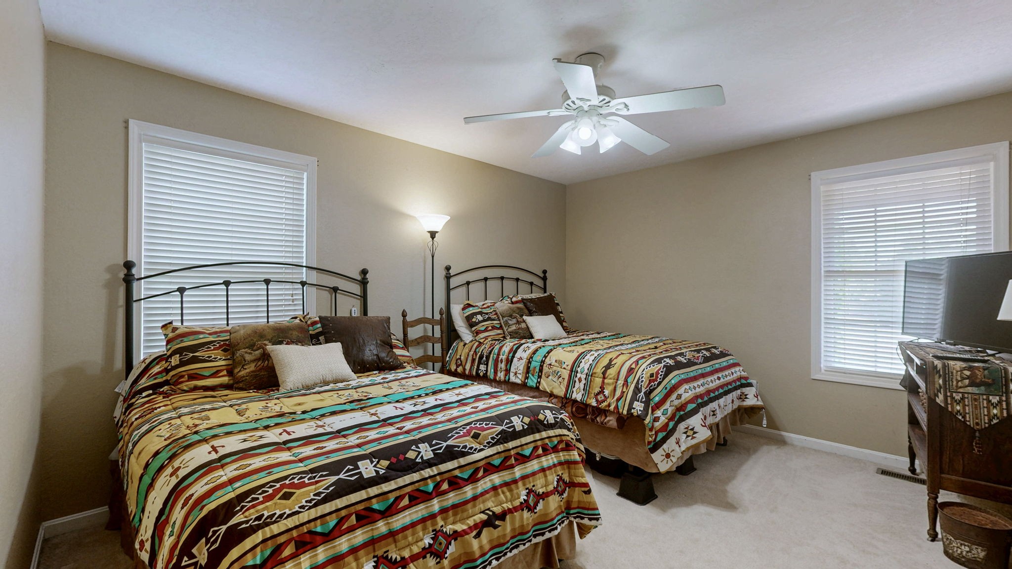 1748 Buffalo Road New Concord, KY 42076 - Photo 19 of 41 a bedroom with two beds and a chandelier