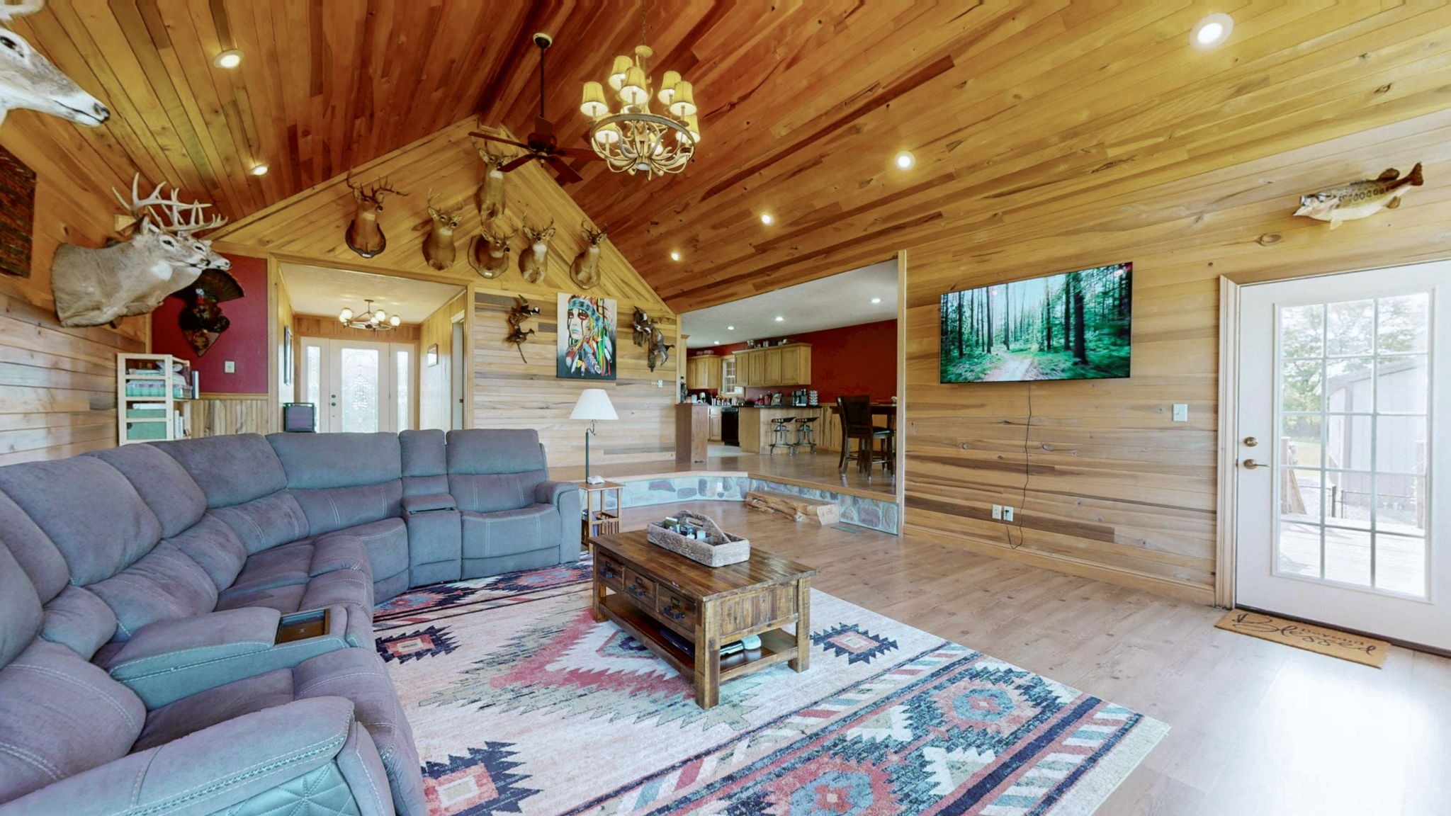 1748 Buffalo Road New Concord, KY 42076 - Photo 2 of 41 a living room with furniture and a flat screen tv
