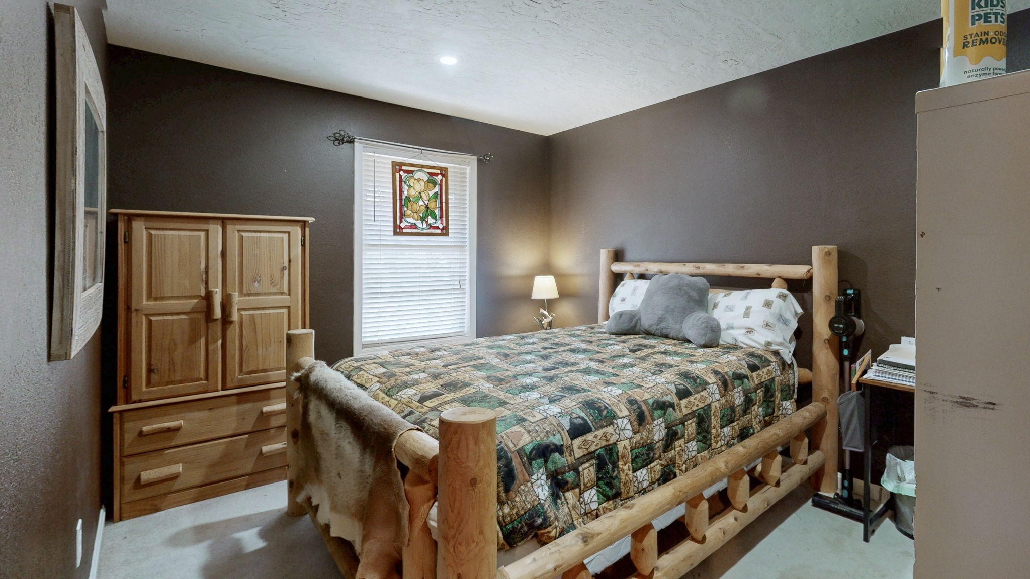 1748 Buffalo Road New Concord, KY 42076 - Photo 24 of 41 a bedroom with a bed and a dresser