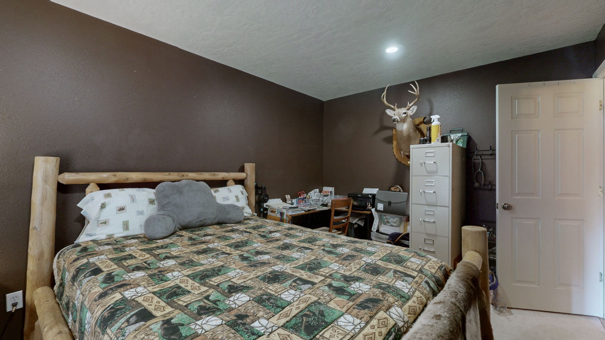 1748 Buffalo Road New Concord, KY 42076 - Photo 25 of 41 a bedroom with a bed and a table in it