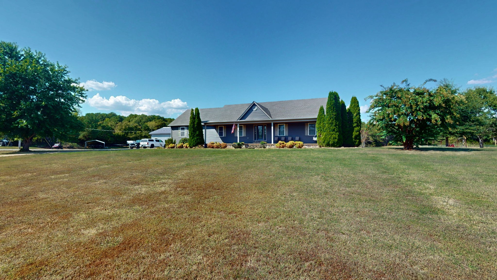 1748 Buffalo Road New Concord, KY 42076 - Photo 28 of 41 a view of a house with a yard
