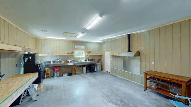 a view of a kitchen and dining room