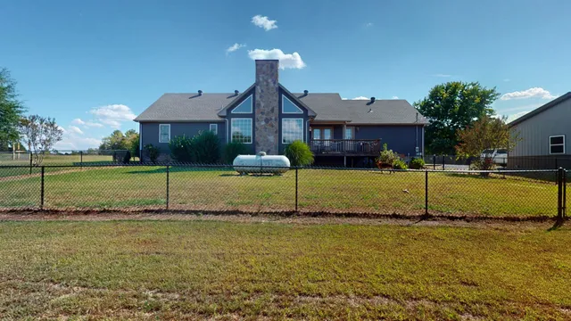 a house view with a outdoor space