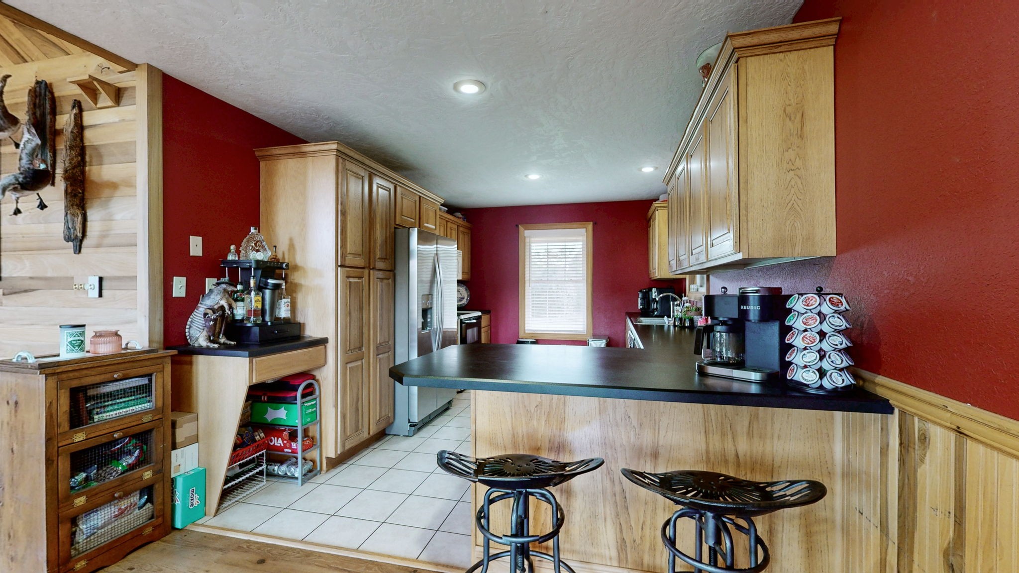 1748 Buffalo Road New Concord, KY 42076 - Photo 10 of 41 a kitchen with stainless steel appliances granite countertop a sink and a refrigerator