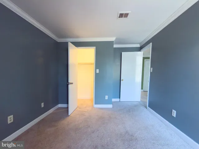 a view of balcony with wooden floor