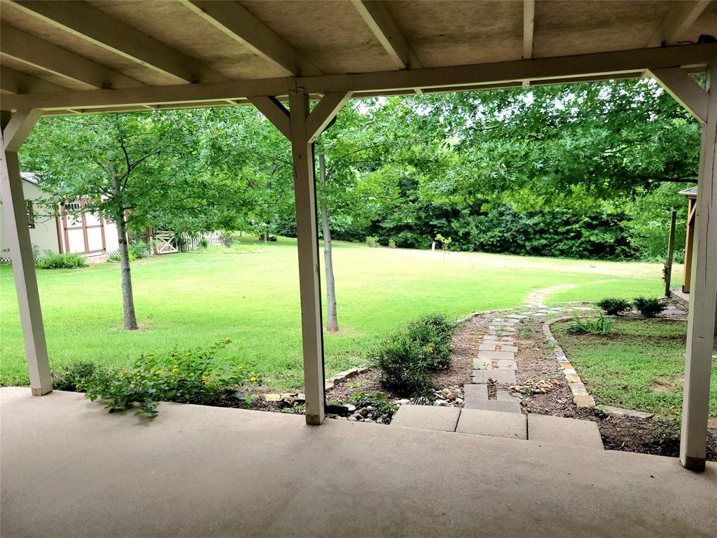912 North Dove Road Grapevine, TX 76051 - Photo 25 of 36 a view of a back yard from a patio