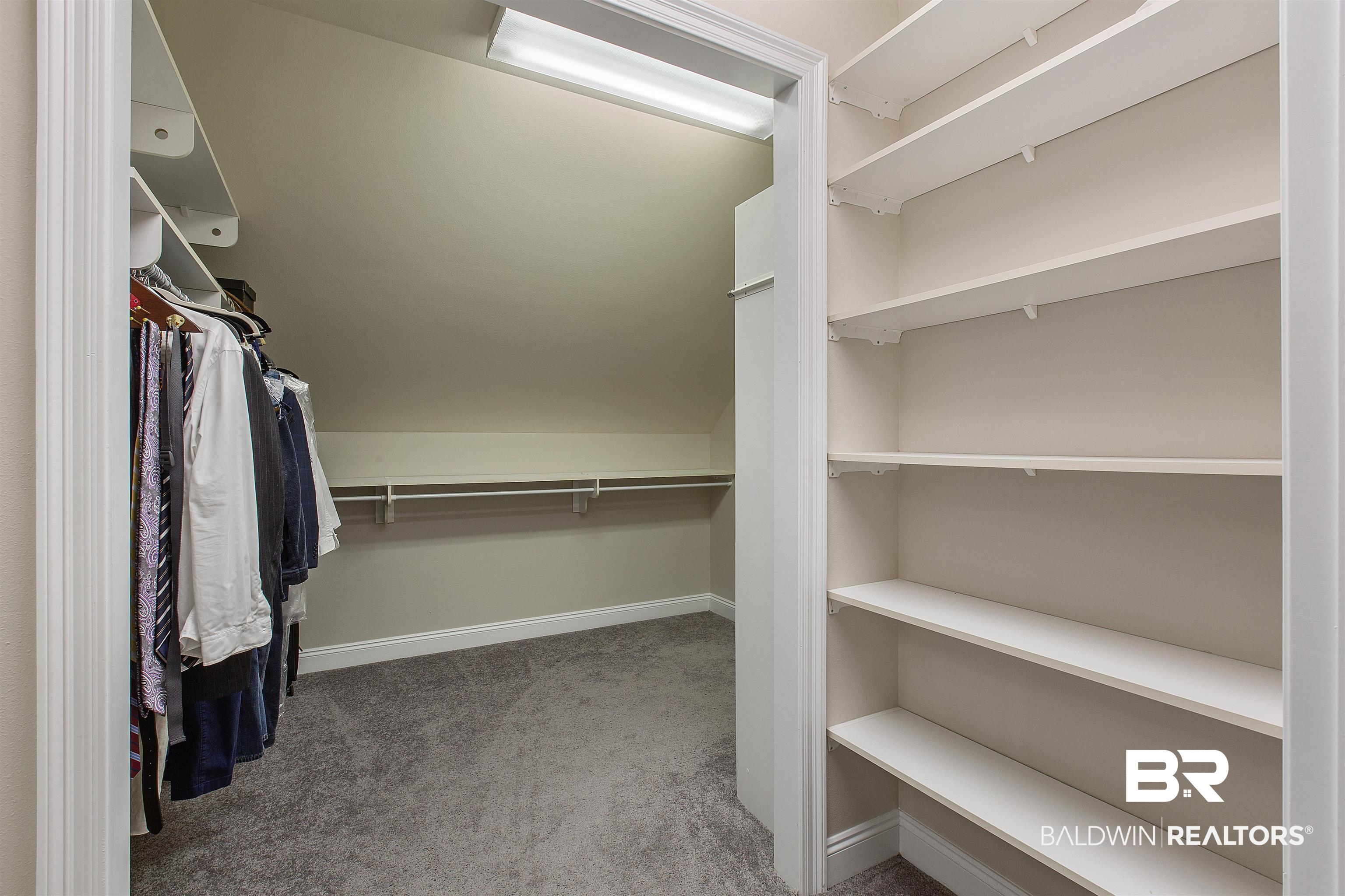 140 Sandy Shoal Loop Fairhope, AL 36532 - Photo 21 of 32 Primary Closet