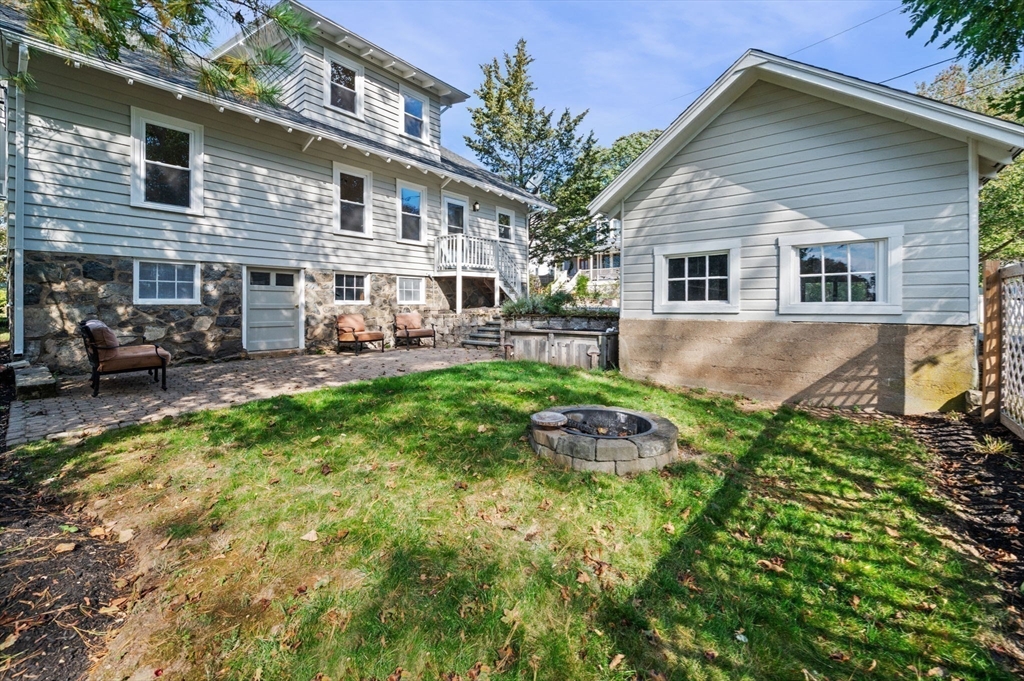 59 Butman Street, Unit 1 Beverly, MA 01915 - Photo 38 of 42 a backyard of a house with seating space