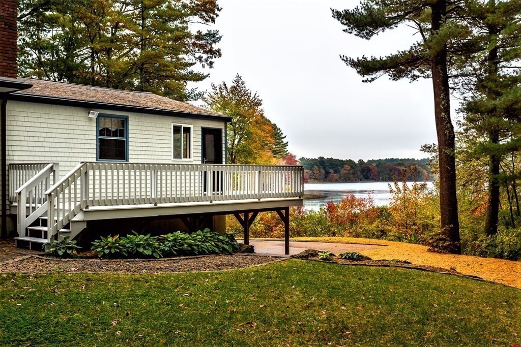 591 Neck Road Rochester, MA 02770 - Photo 26 of 32 a view of a house with a ocean view