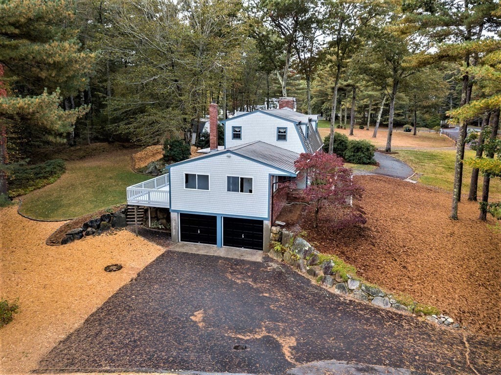 591 Neck Road Rochester, MA 02770 - Photo 8 of 32 a view of a house with a yard